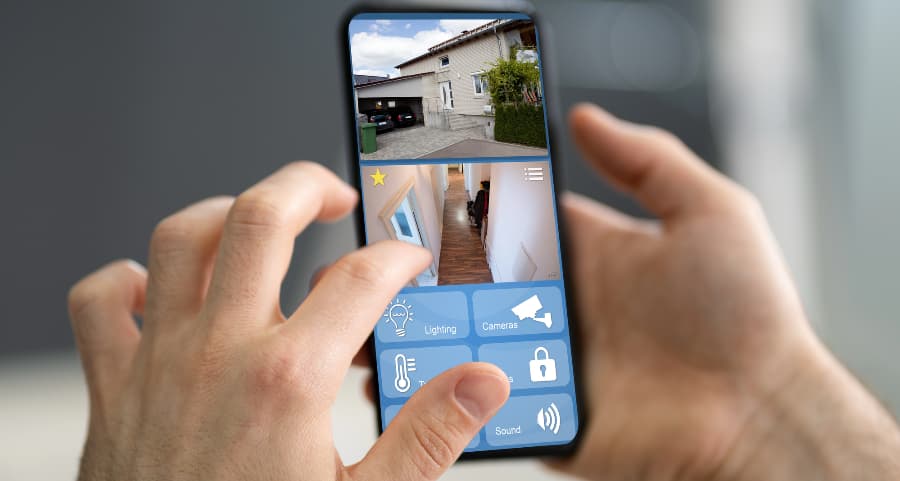 Person examining surveillance camera streams on a mobile device